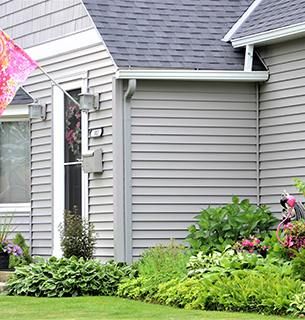 Freshly installed siding on a home exterior